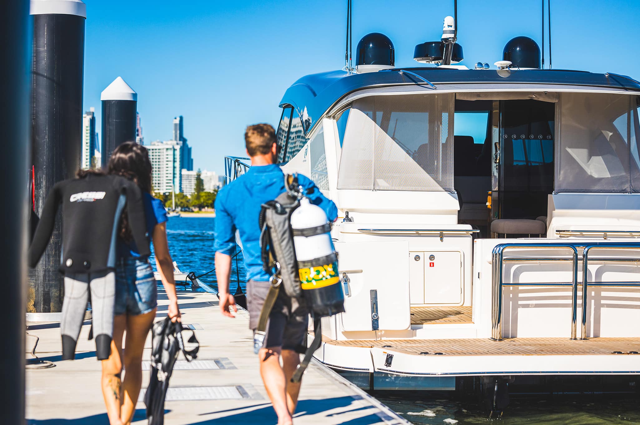 From one Gold Coast icon to another, the Gold Coast City Council called on a Riviera 505 SUV to ferry some of the very ﬁrst divers out to the reef. Image credit: Destination Gold Coast