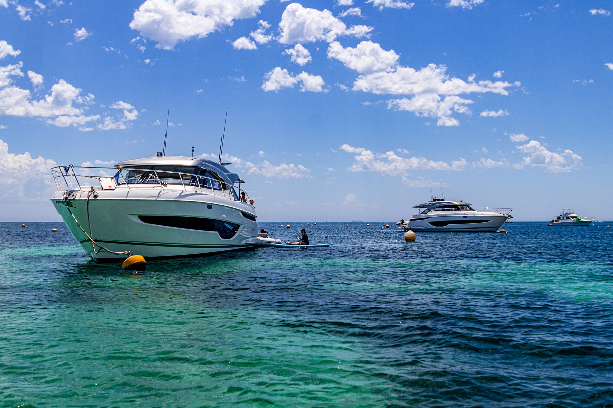 The perfect backdrop to enjoy water sports like paddle boarding.
