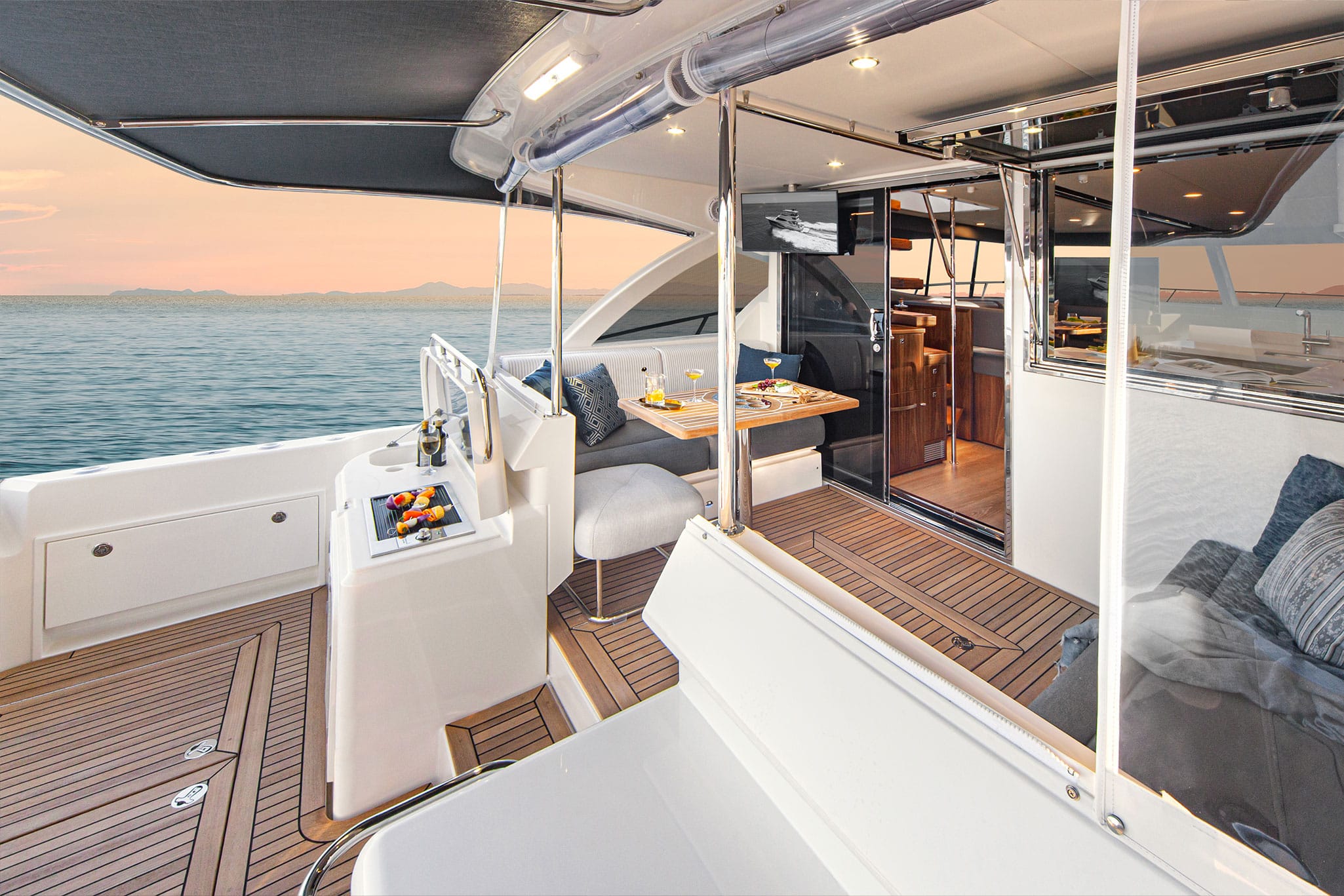 The 46 Sports Motor Yacht offers multiple entertaining spaces that stretch from the deep boarding platform to relaxing foredeck sun lounges and a generous open flybridge with hardtop.