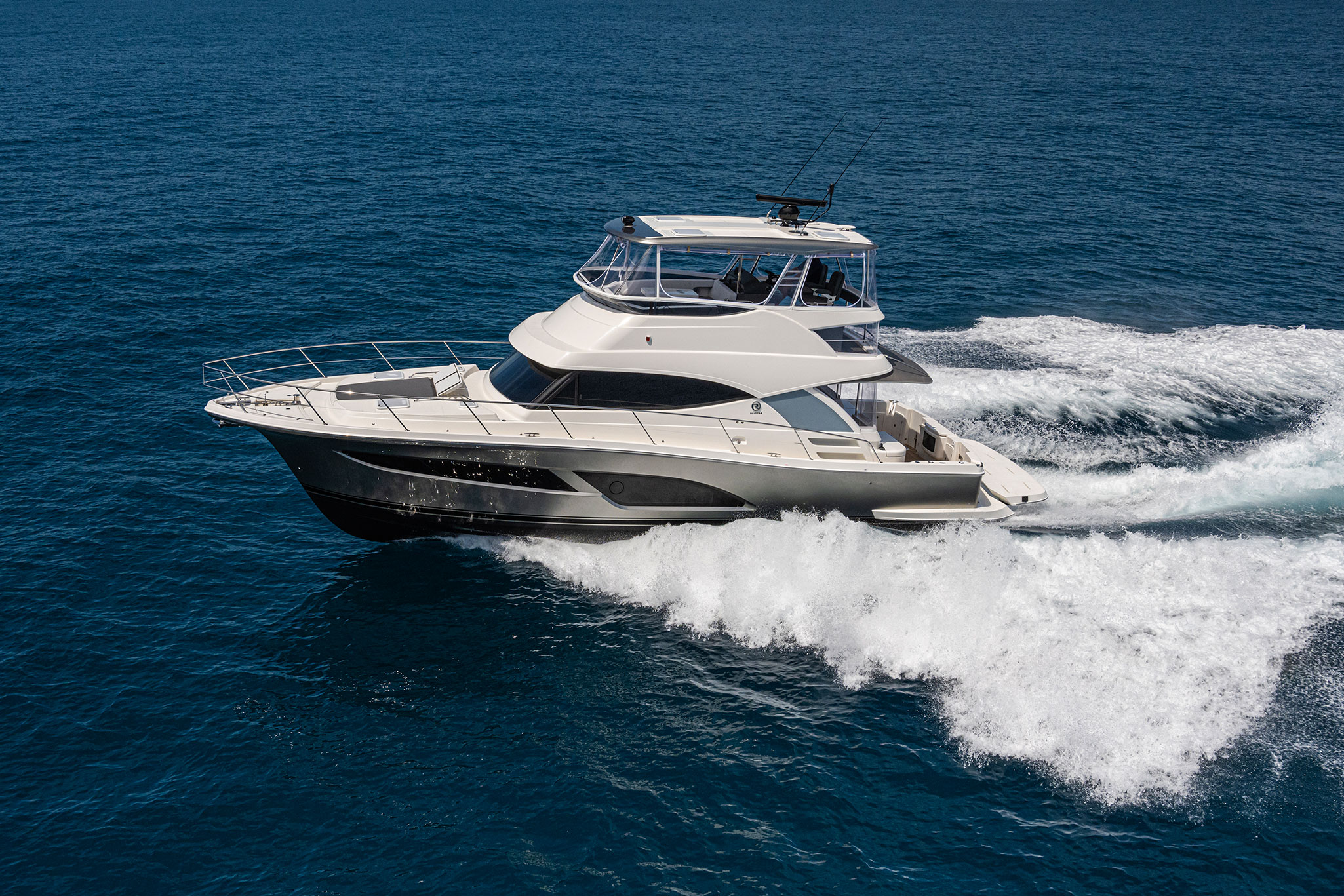 The 46 Sports Motor Yacht offers multiple entertaining spaces that stretch from the deep boarding platform to relaxing foredeck sun lounges and a generous open flybridge with hardtop.