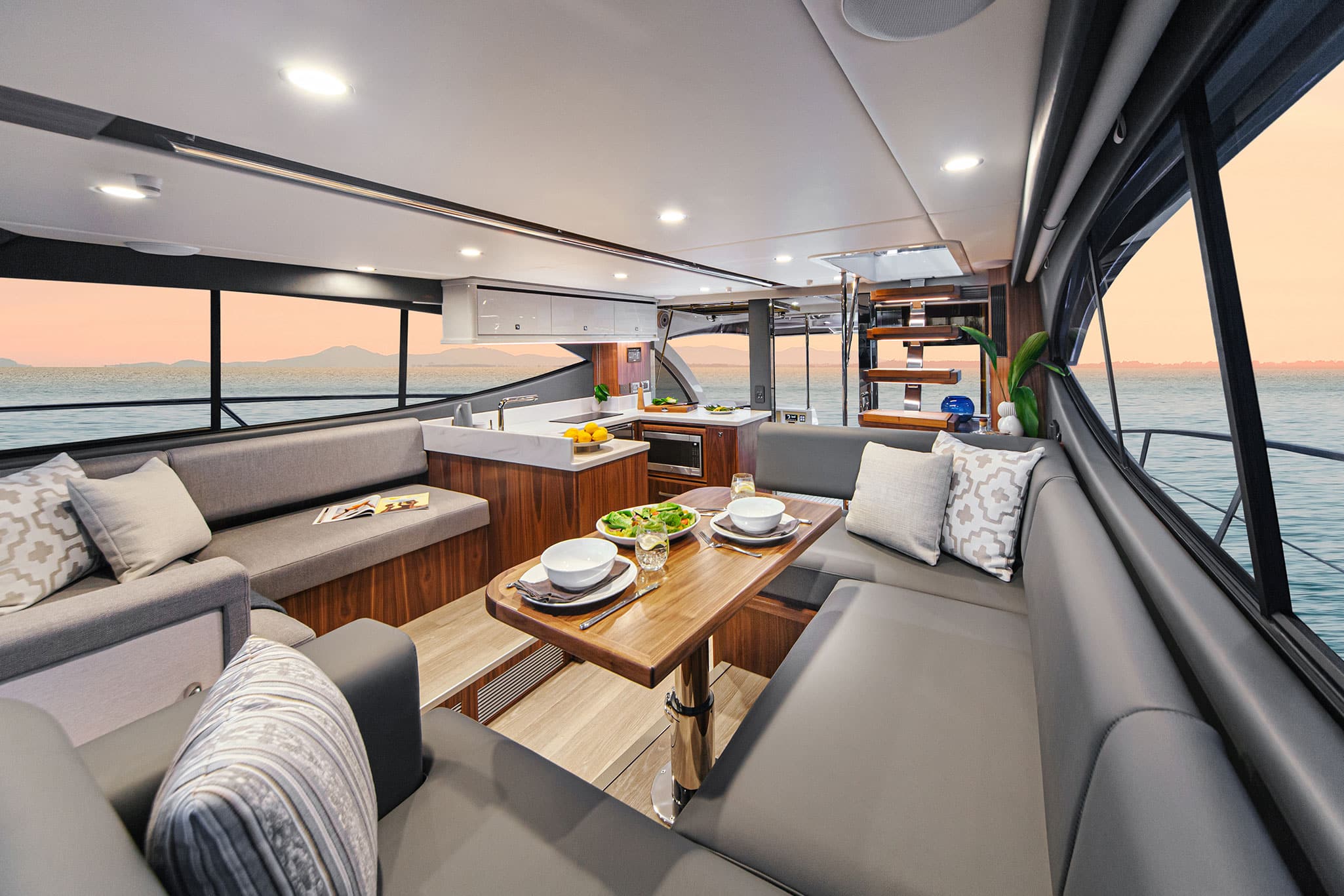 The very social, light, and airy saloon of the Riviera 46 Sports Motor Yacht.
