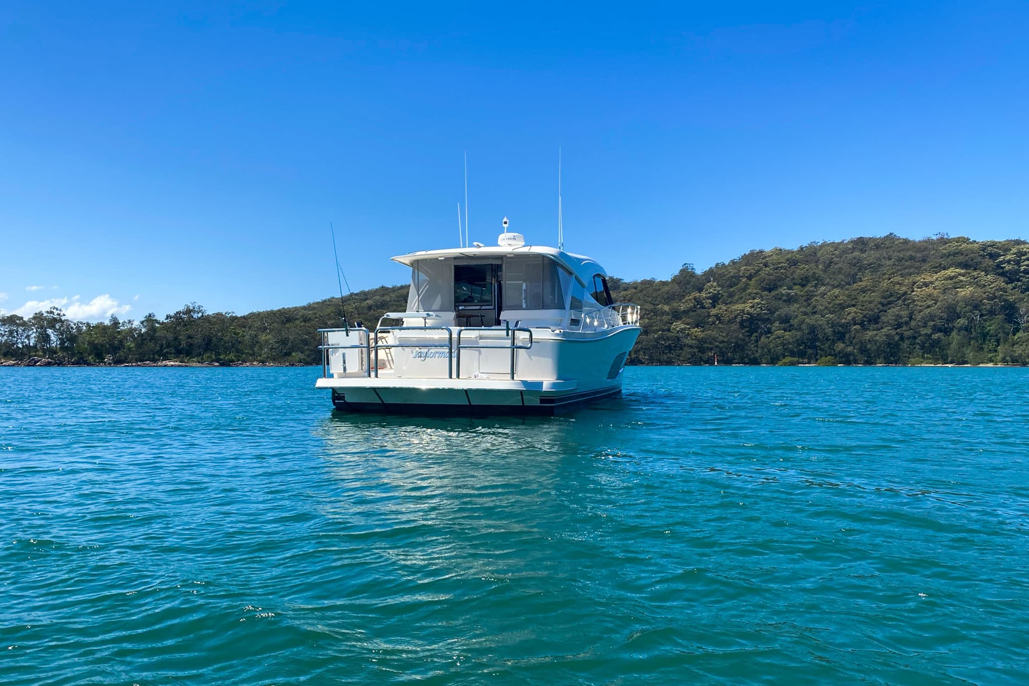 Riviera 505 SUV Taylor Made and her crew enjoying the serenity of being at anchor.