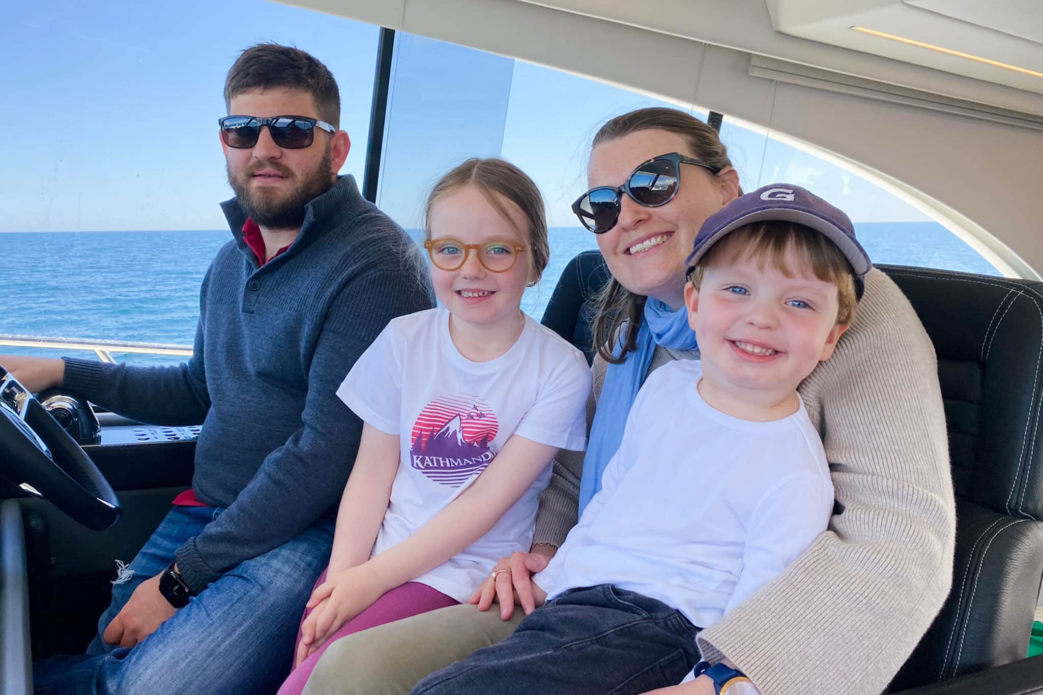 Its smiles all round for Josh at the wheel with his family.