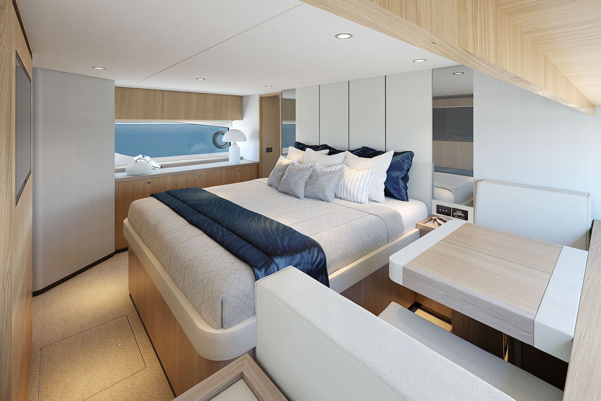 The full-beam master stateroom features a private bathroom and walk-in wardrobe with an optional breakfast bar