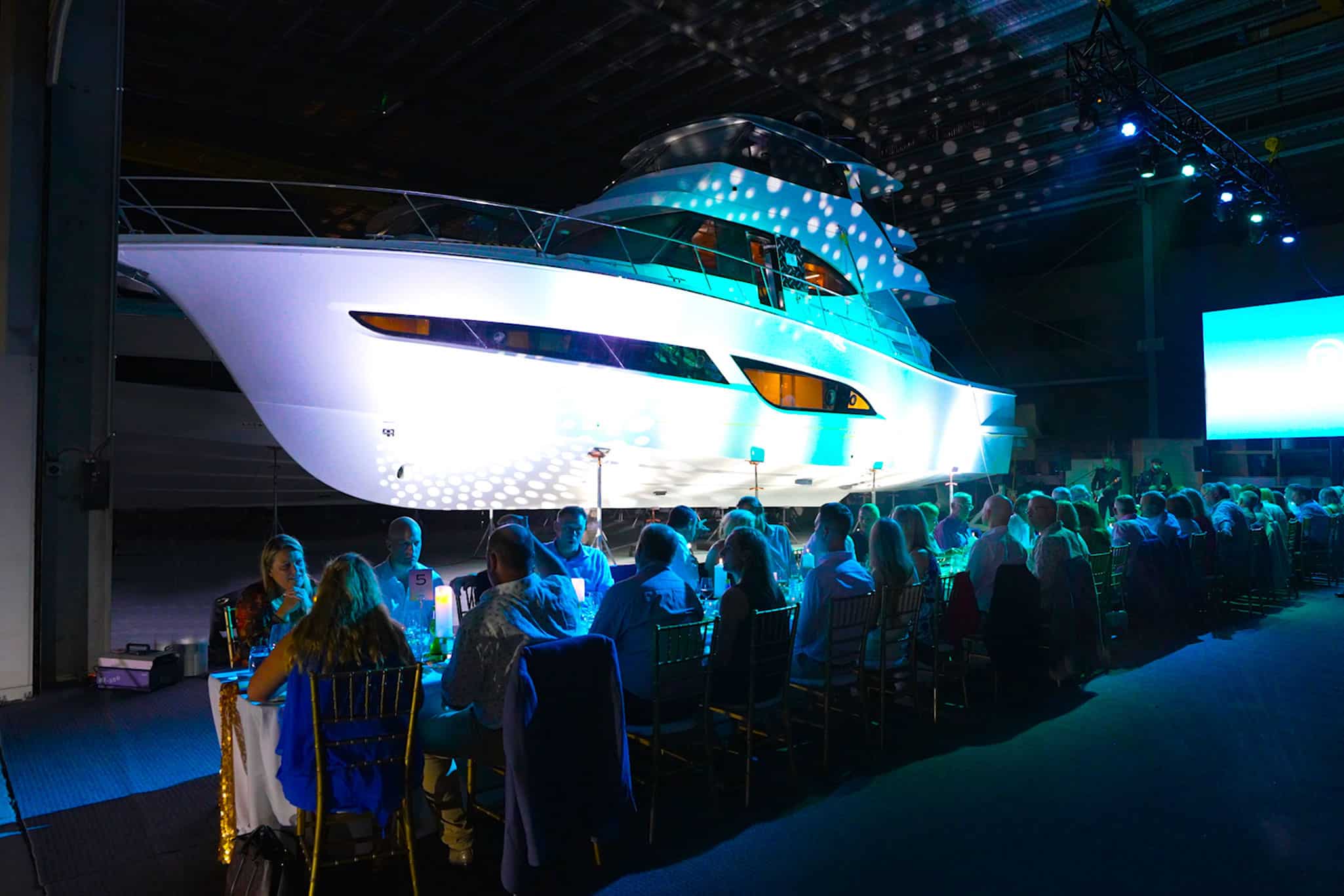 A spectacular backdrop to the gala dinner was a 58 Sports Motor Yacht.