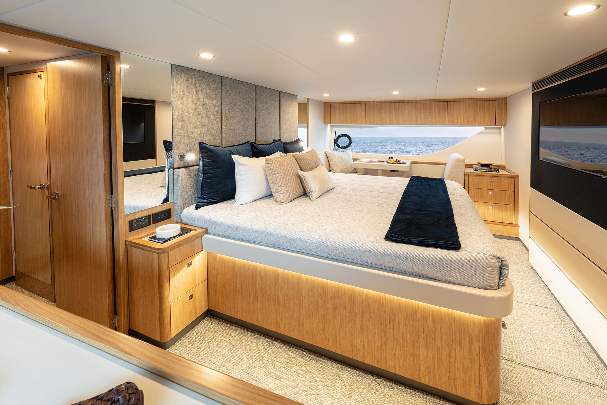 The full-beam master stateroom features a private bathroom and walk-in wardrobe with an optional breakfast bar.
