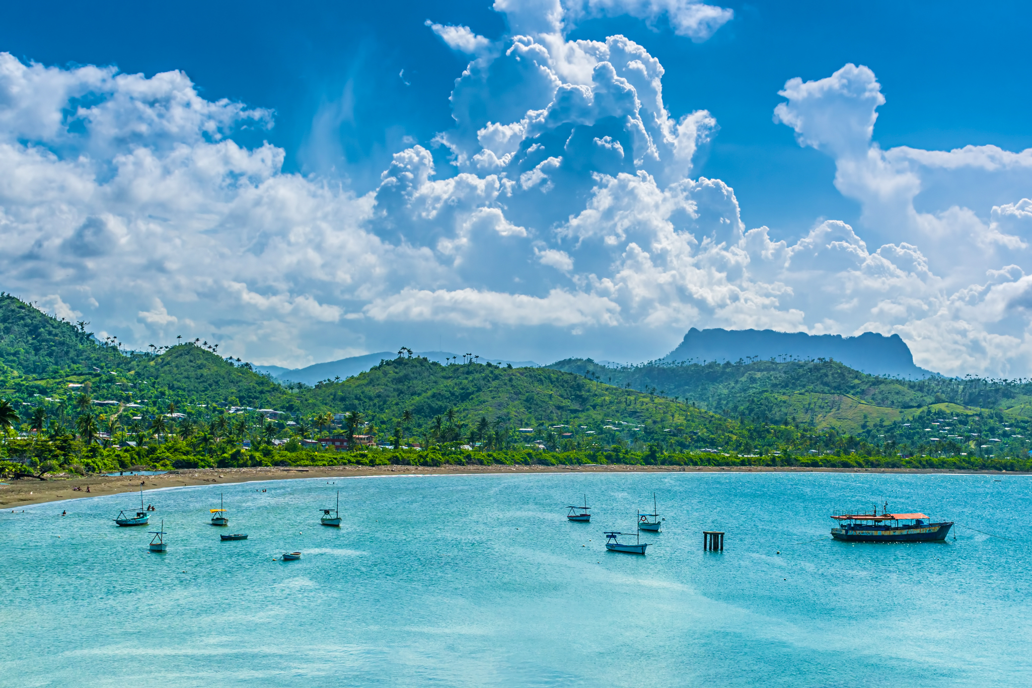 The Bay of Baracoa with El Yunque table mountains in the background.