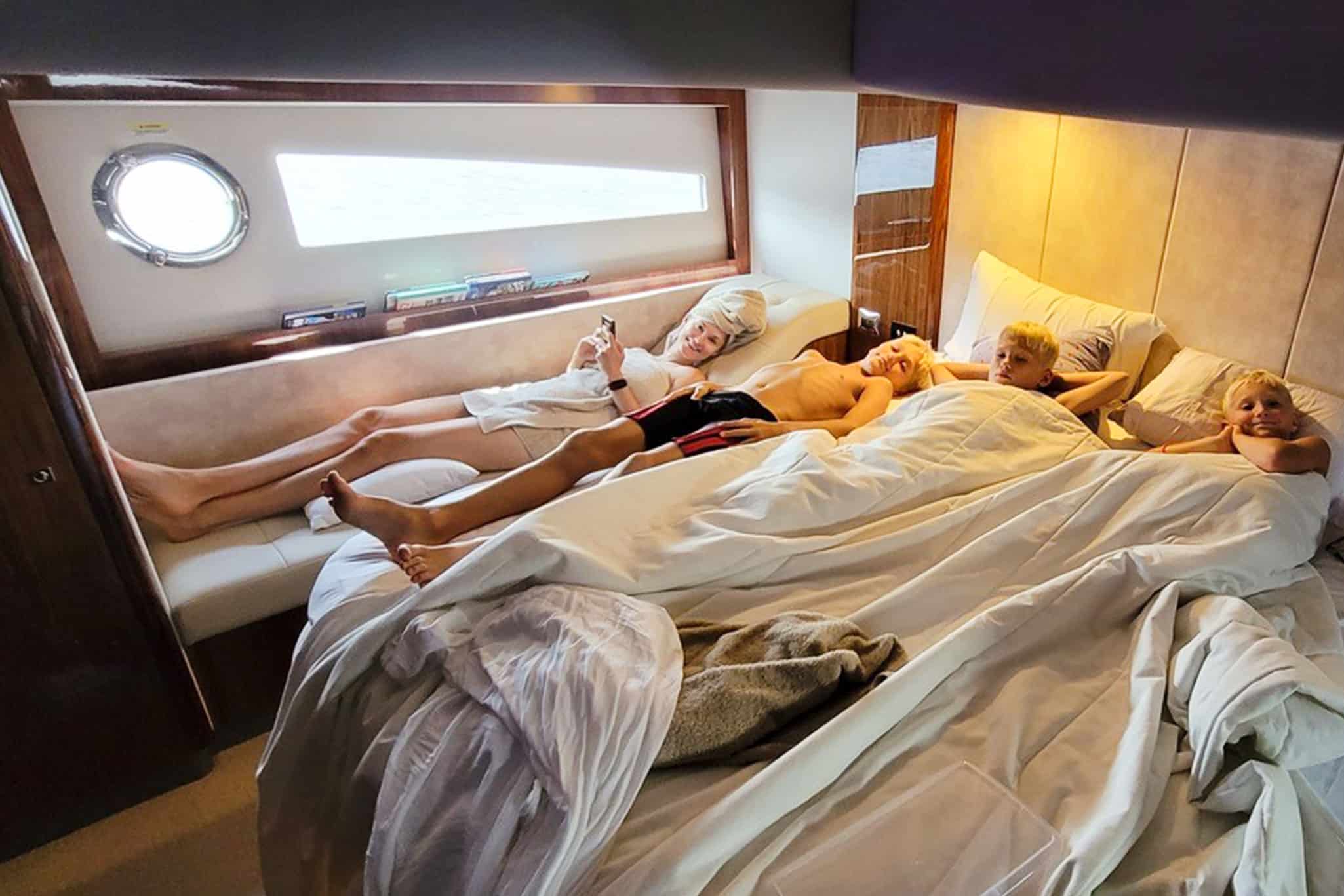 The grand kids enjoying some movie-time in the master stateroom. There’s plenty of room for everyone here.