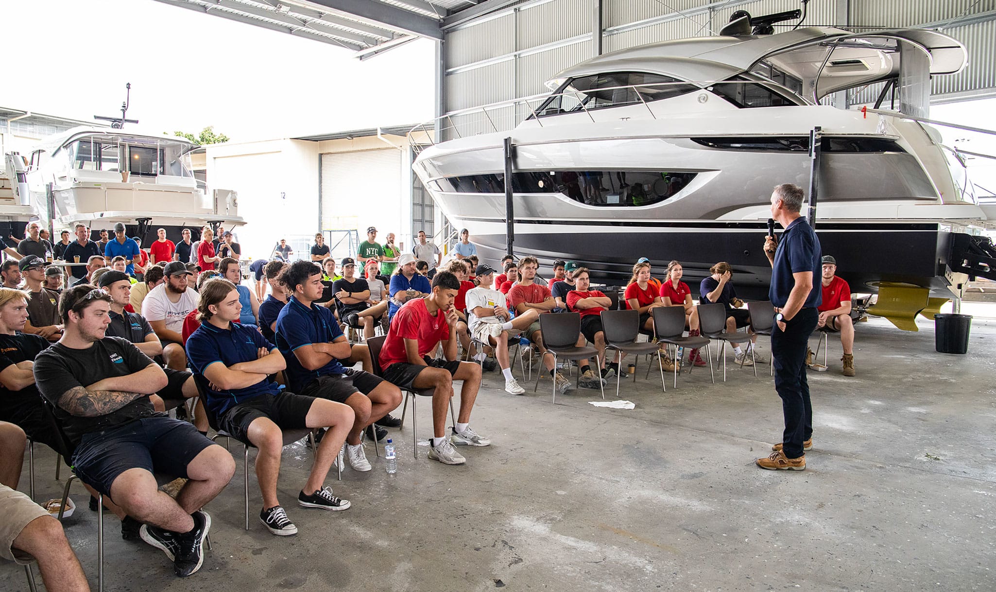 Riviera Australia owner Rodney Longhurst addresses the apprentice team during the award ceremony