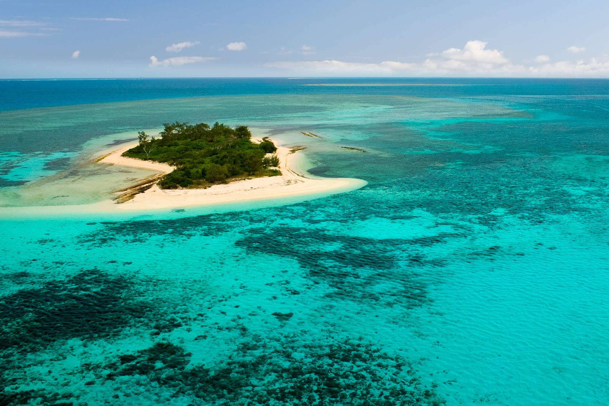 Discover a living aquarium under the pristine waters of New Caledonia, which has one of the three largest barrier reef systems in the world.
