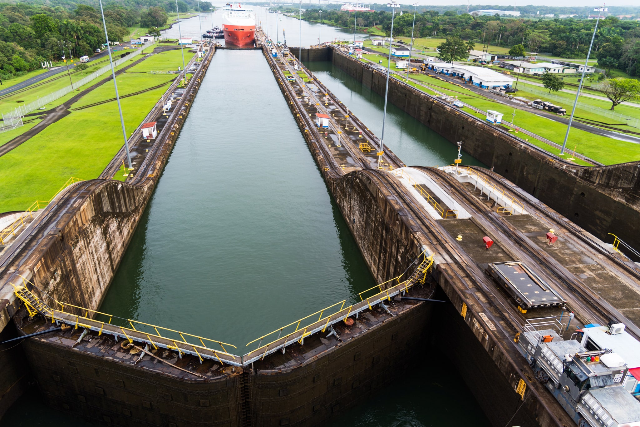 The Panama Canal gate locks of Miraflores opening on a lovely summer day near Panama City.