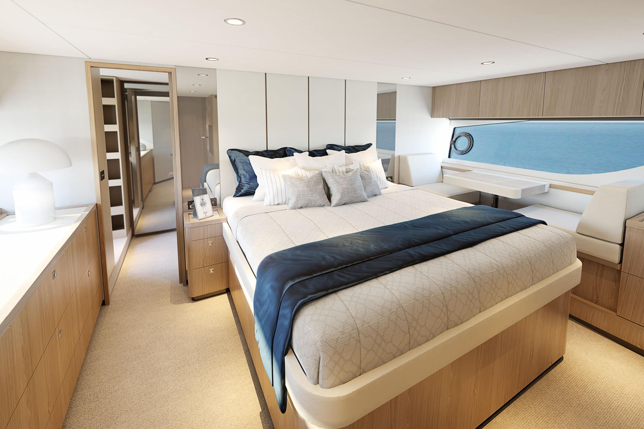 The full-beam master stateroom features a private bathroom and walk-in wardrobe with an optional breakfast bar