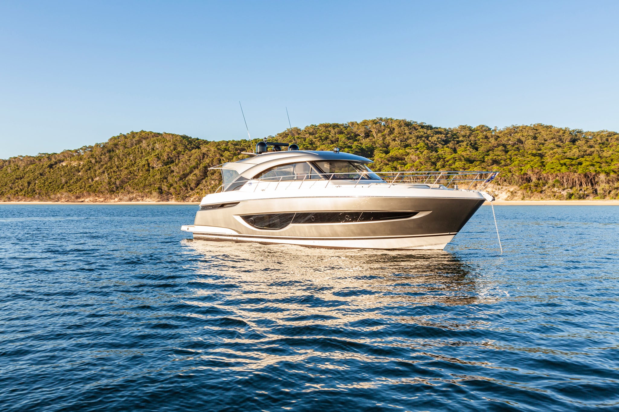 The jaw dropping lines of the Riviera 4600 SY at anchor.