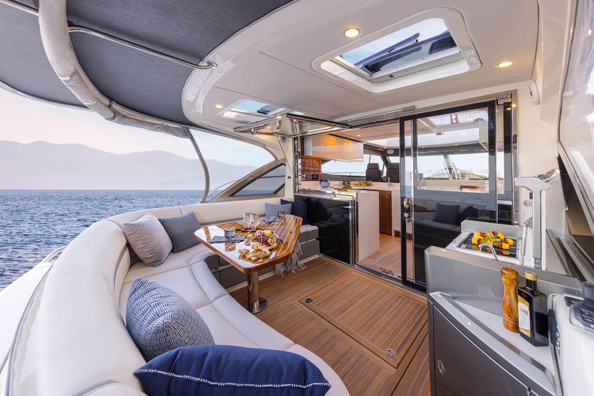 The wrap-around lounge in the cockpit of the Riviera 4600 Sport Yacht Platinum Edition.