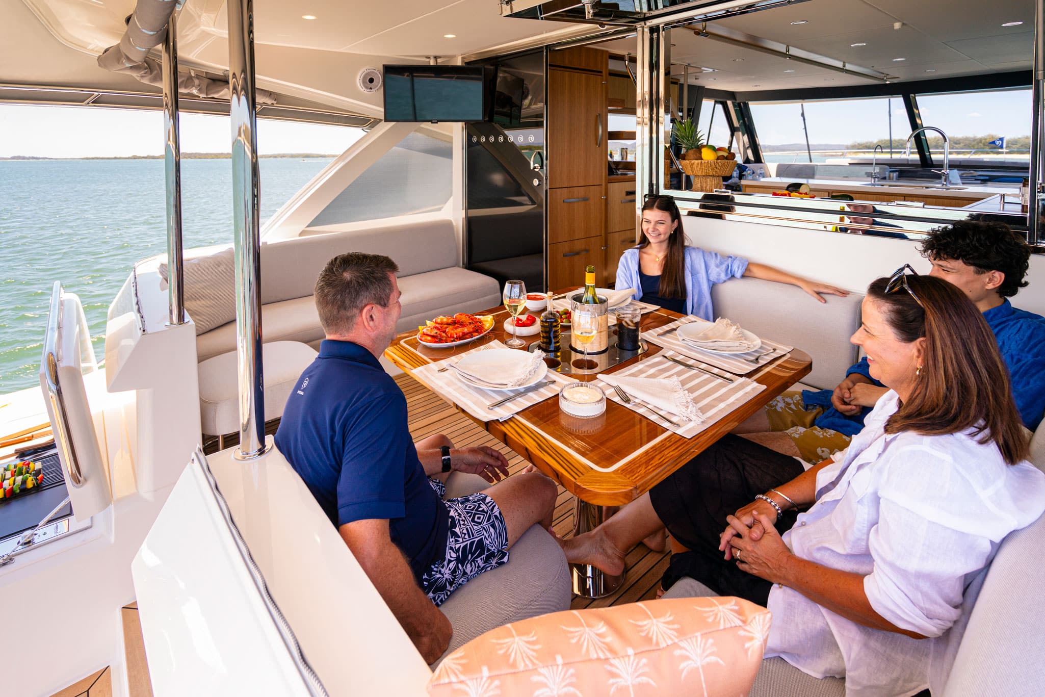 Superb dining space on the alfresco deck of the 58 Sports Motor Yacht.