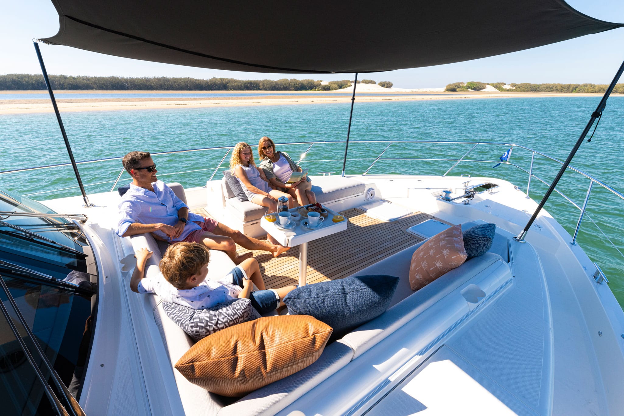 Plenty of room for the entire family in the foredeck lounge of the Riviera 585 SUV.