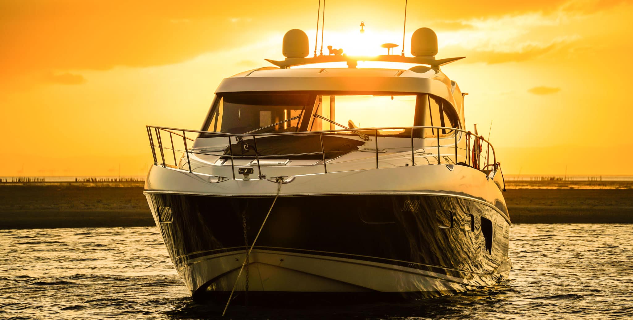 Sunset glory: Sierra Golf, a Riviera 6000 Sport Yacht
