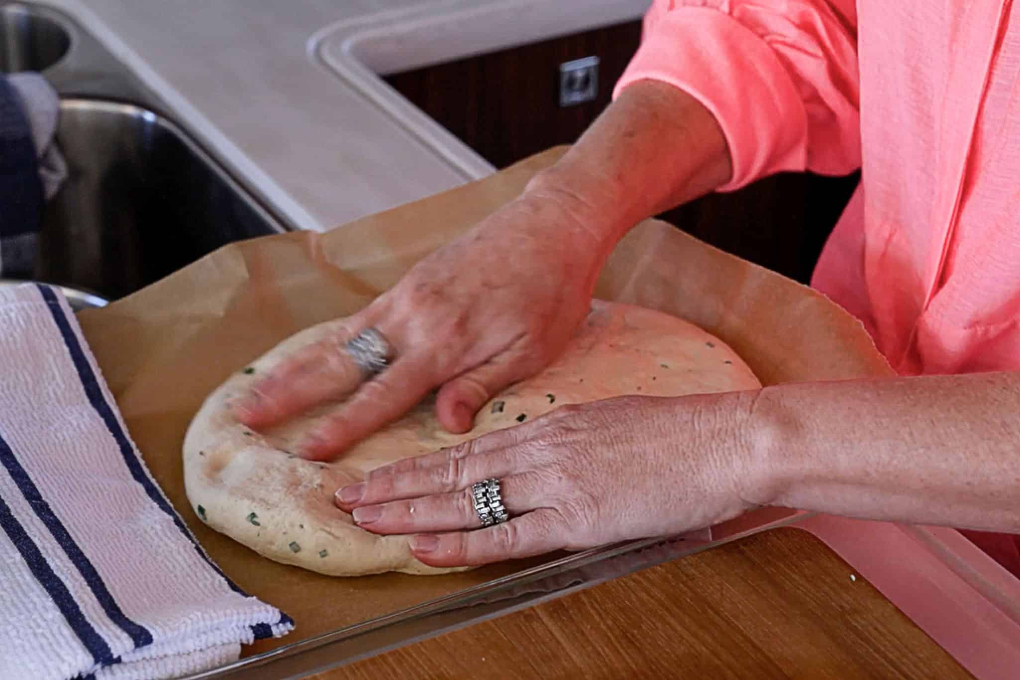 Working to prepare the focaccia.