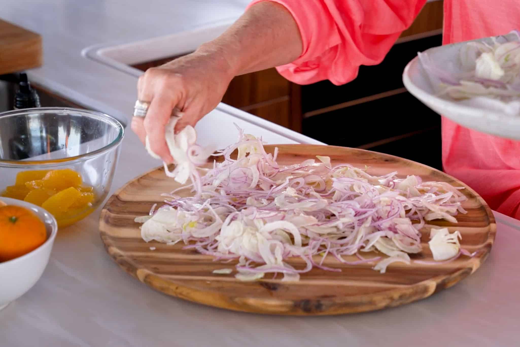 Chill the fennel and onion in iced water before arranging over a serving board.