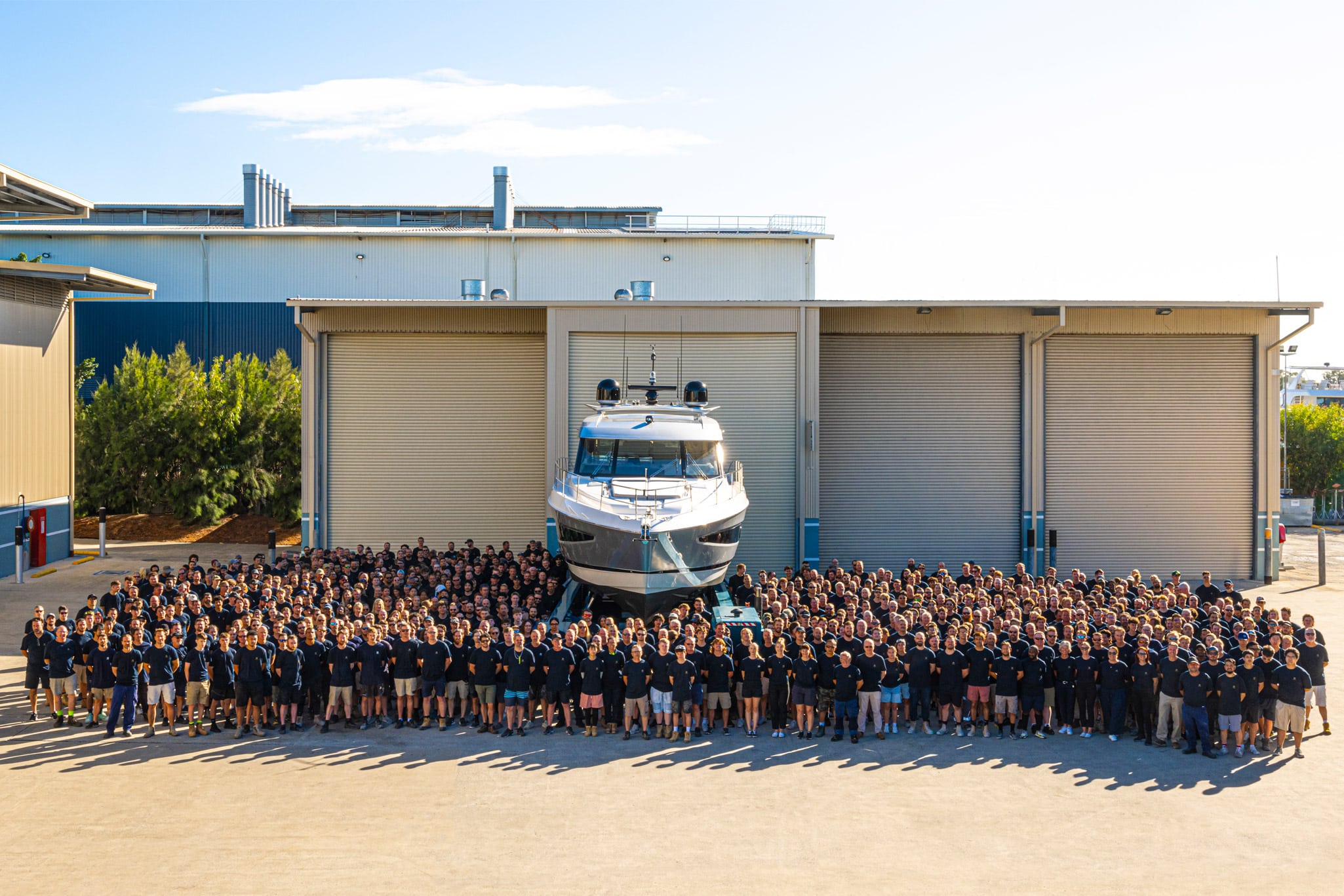 The Riviera team of 950 people celebrate the launching of the 6,000th Riviera at the company's 16.8 hectare facility on the Gold Coast.