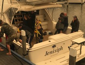 Issue-1-2020-A-mother-rescued-by-Phil-Ridgeway-gives-him-a-grateful-hug-on-arrival-at-Paynesville