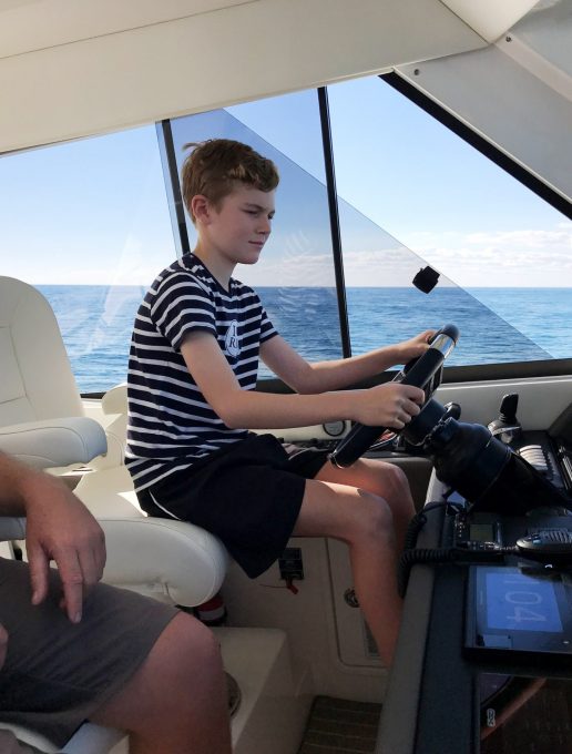 Optm-Josh-at-the-helm-of-his-grandads-Riviera-52
